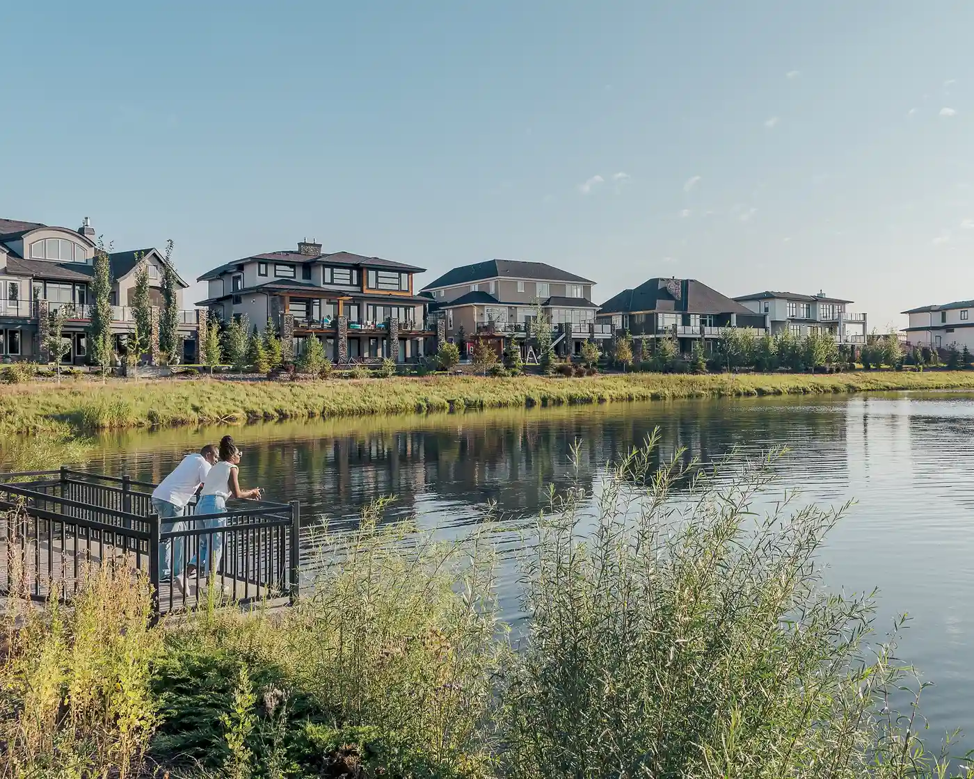 Couple looking out onto a pond in Watermark